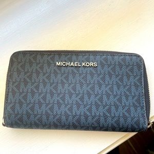 Michael Kors navy wallet. Barely used.